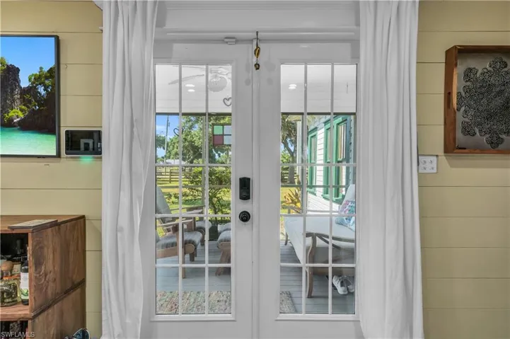 Entryway featuring French doors and plenty of natural light