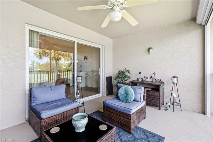 Back Screened lanai overlooking golf course and lake