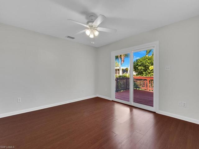 Downstairs Bedroom Two with Sliding Glass Door to Deck