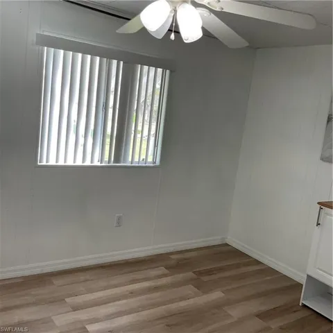 Empty room featuring light hardwood / wood-style flooring