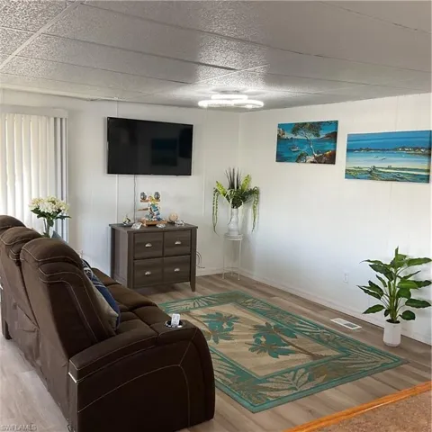 Living room featuring light hardwood / wood-style flooring