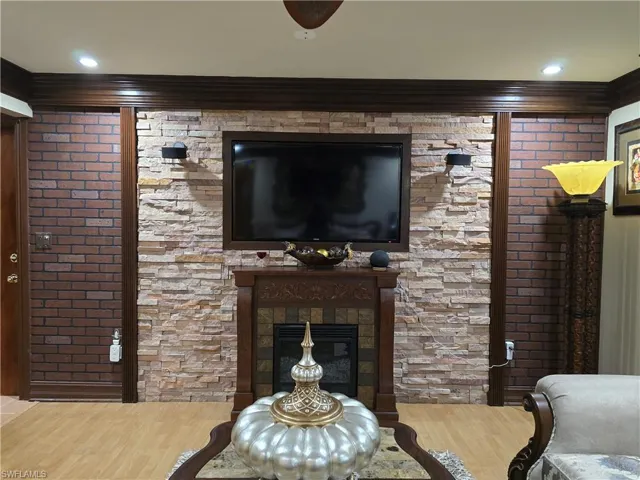 Living room with hardwood / wood-style floors