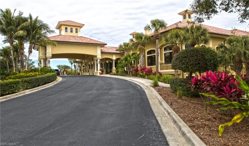 View of asphalt road featuring curbs