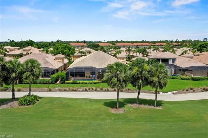 Aerial perspective of suburban area with a local golf course