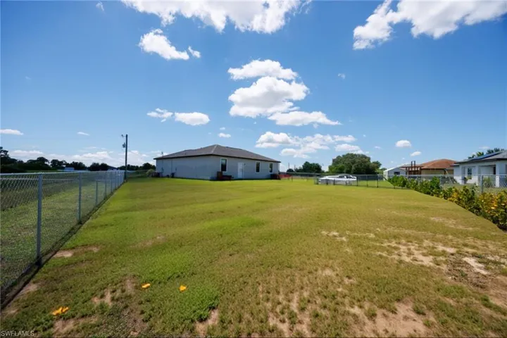View of fenced backyard