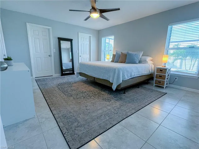Bedroom featuring ceiling fan and light tile patterned floors