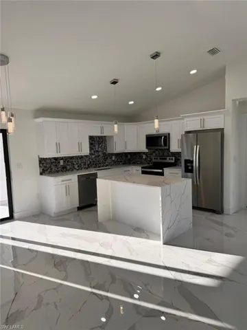 1306 NW Juanita  PL, Cape Coral, FL 33993