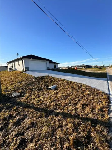 1306 NW Juanita  PL, Cape Coral, FL 33993