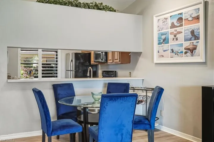 Dining space featuring light wood finished floors and baseboards