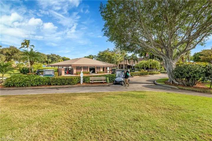 Surrounding community with a yard and driveway
