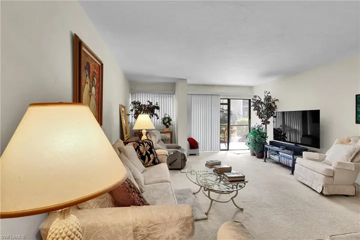 Living room featuring carpet floors