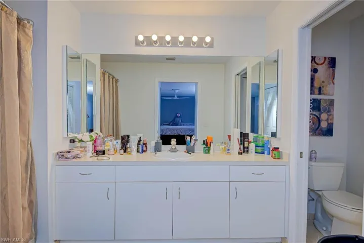 Full bath with vanity and ensuite bathroom