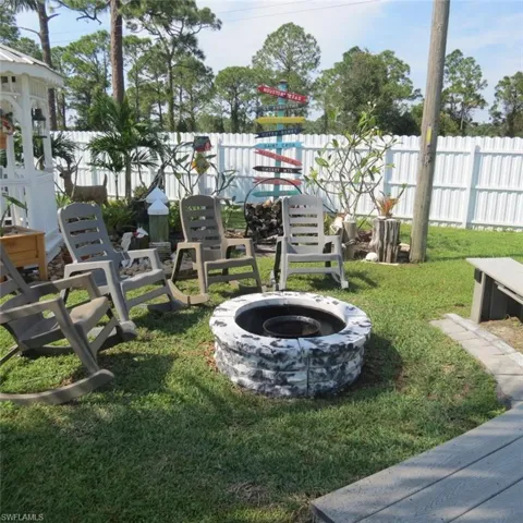 View of yard featuring a fire pit