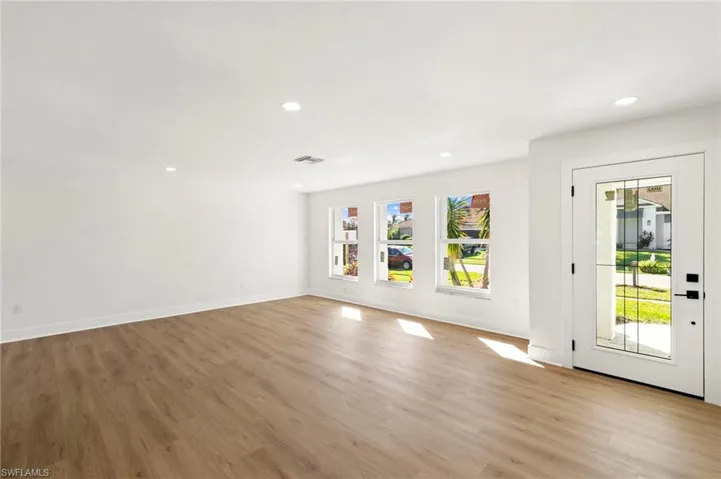 Bright, airy living space filled with natural light.