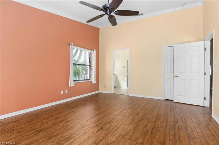 Primary bedroom:  door on left to bath.  Door on right to Great room.  Closet door behind
