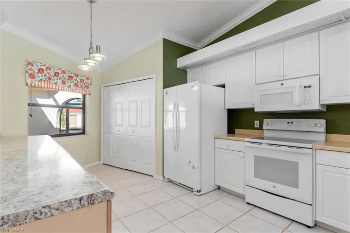 Large kitchen with laundry rm at end