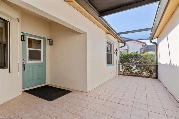 Screened Courtyard between garage and entrance