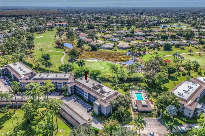 Aerial view of a nearby body of water and a golf course