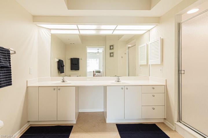 Primary Bathroom with Dual sinks and step-in shower
