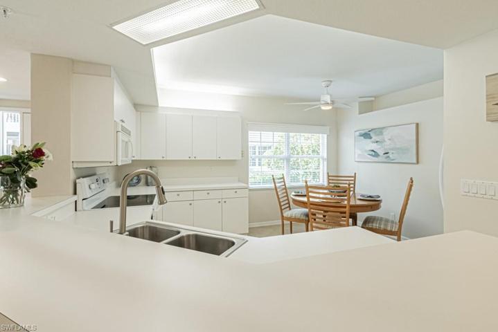Bright White Kitchen with Breakfast Bar