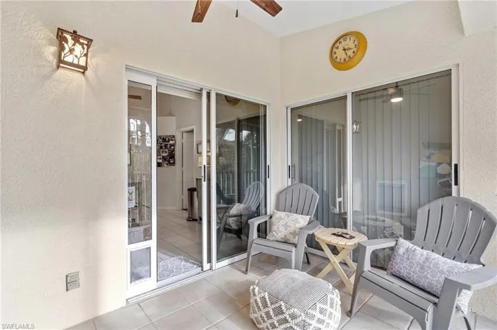 Sunroom featuring ceiling fan