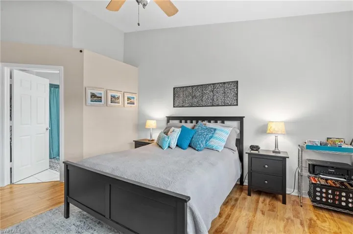 Bedroom featuring ceiling fan and light hardwood / wood-style floors