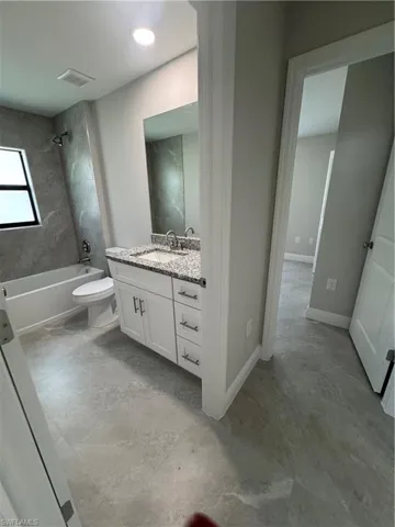 Full bath with vanity and  shower combination