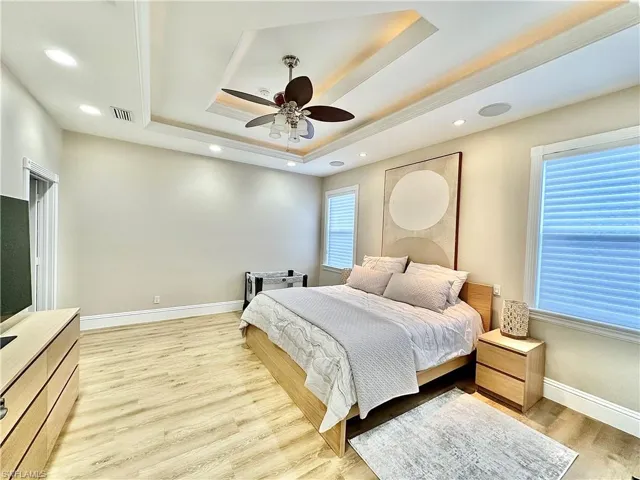 Bedroom with recessed lighting, light wood-style flooring, and ceiling fan