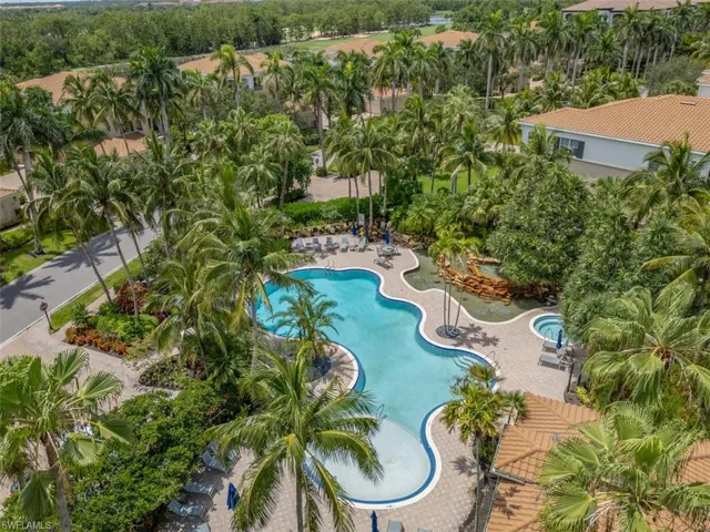 Community pool with view of greenery