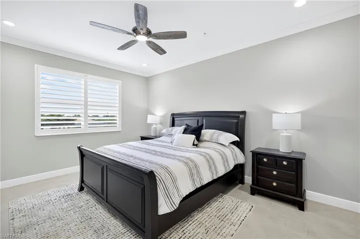 Bedroom featuring crown molding, ceiling fan, recessed lighting, and light tile patterned floors
