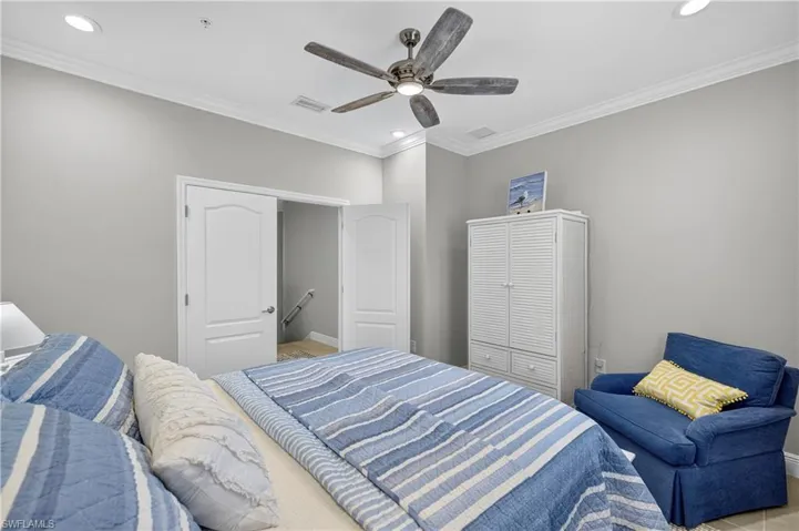 Bedroom featuring ornamental molding, recessed lighting, and a ceiling fan