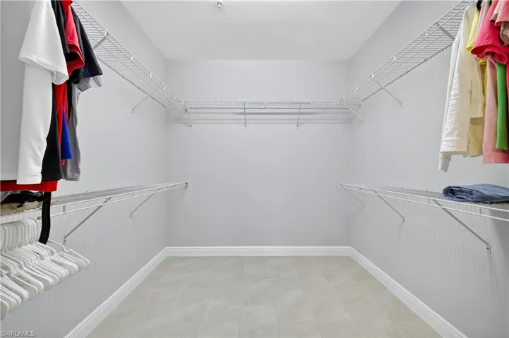View of large walk in closet in primary.