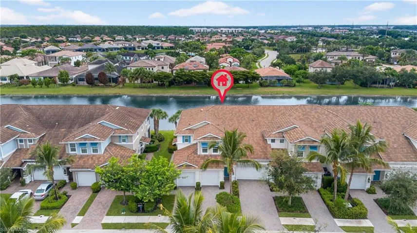 Aerial view of residential area with a nearby body of water