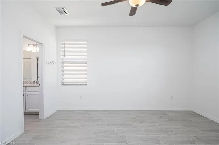 Unfurnished room with ceiling fan