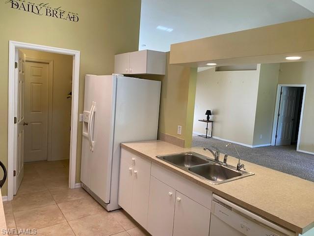 View towards laundry/utility room and great room from Ktichen