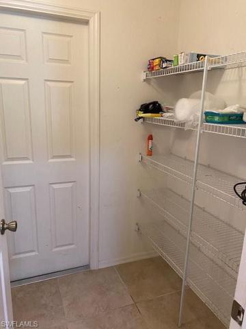 Extra storage in laundry room.....great for pantry area.  Doorway leads to garage.