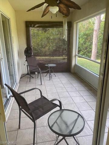 Screened and tiled lanai overlooking the back yard