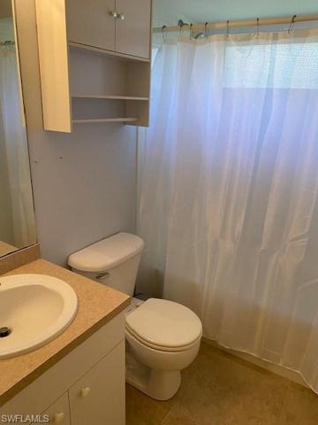 Guest bathroom with combination tub & shower