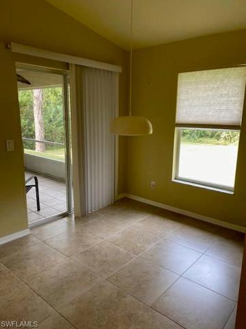 Sliding door leads to screened lanai