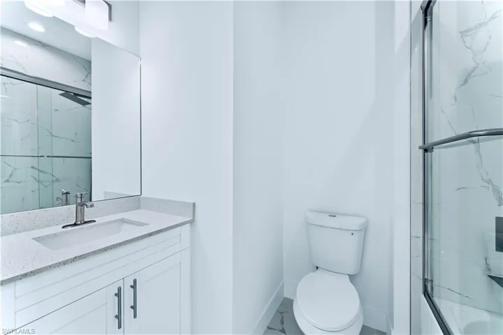 Bathroom with vanity and toilet