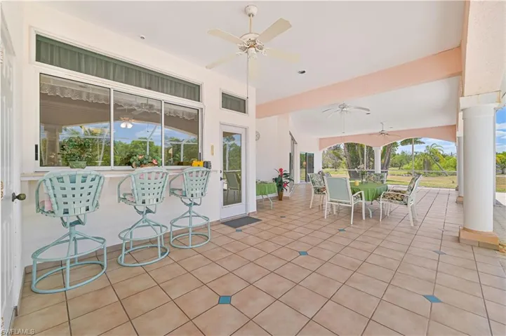 View of patio / terrace featuring a ceiling fan