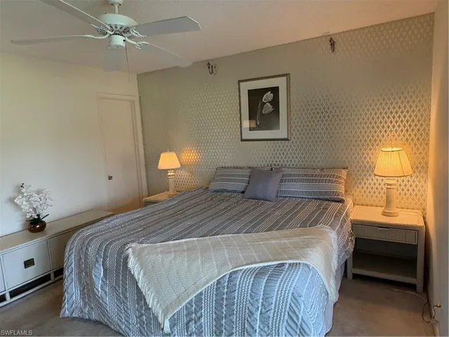 Bedroom featuring carpet flooring and ceiling fan