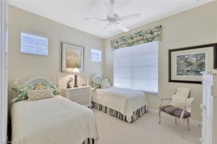 Guest Bedroom with a pocket door to the bathroom creates a great private suite.