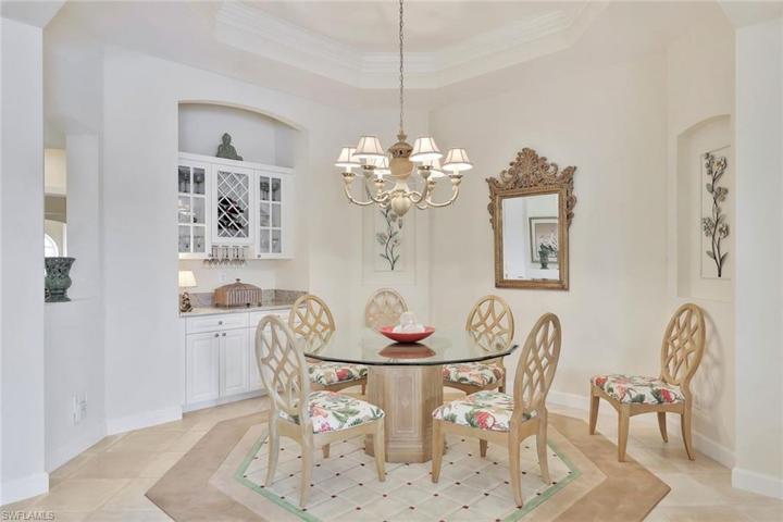 Dining Room with a bar for entertaining.