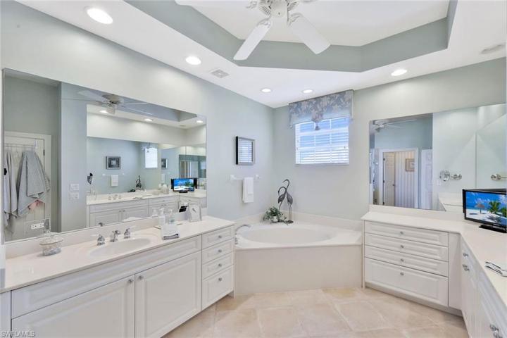 New Frameless glass and new Kohler toilet in master bathroom