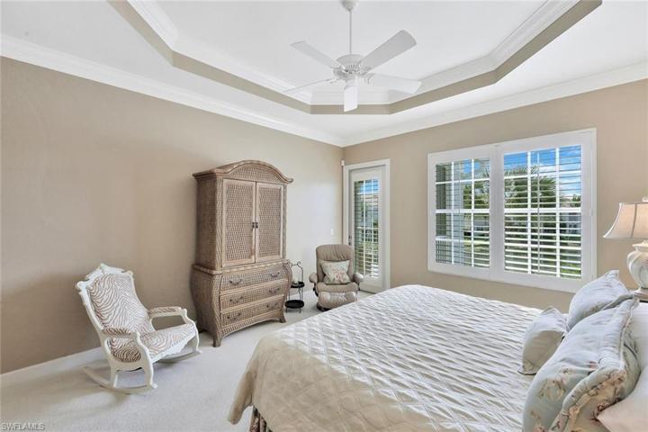 Spacious master bedroom with a view and door to lanai