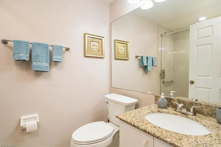 Full bath with a shower and vanity