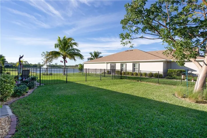 View of fenced backyard