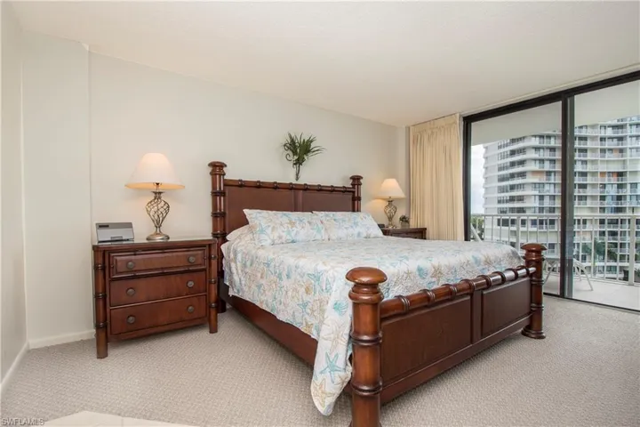 Bedroom featuring carpet and access to outside