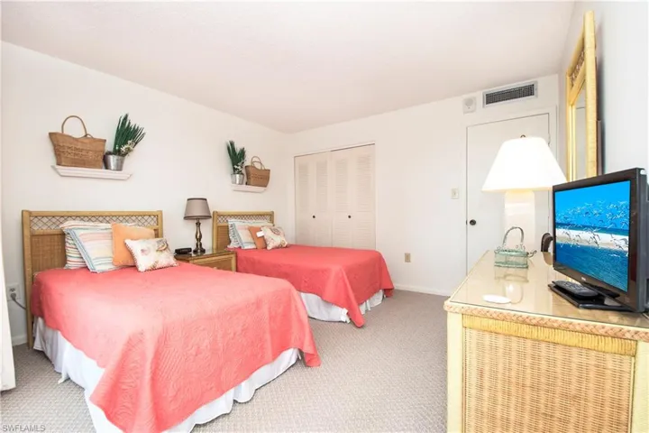 Bedroom with a closet and carpet